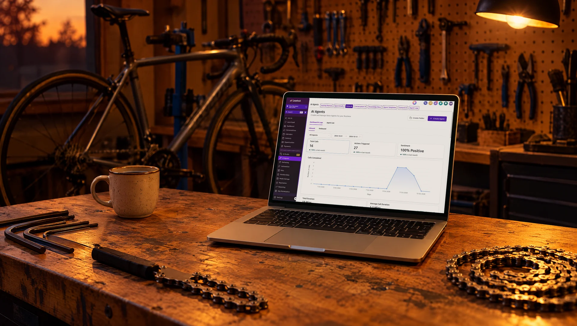 A bike workshop bench with a laptop showing the Voice AI call dashboard